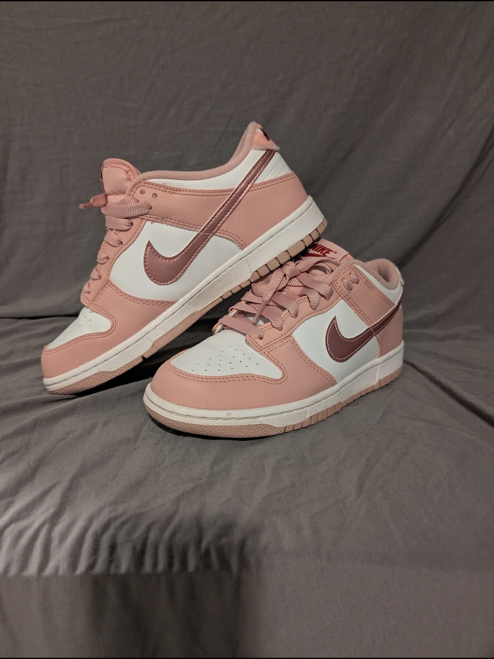 Nike Low-Top Sneakers in Blush Pink and White with Metallic Swoosh